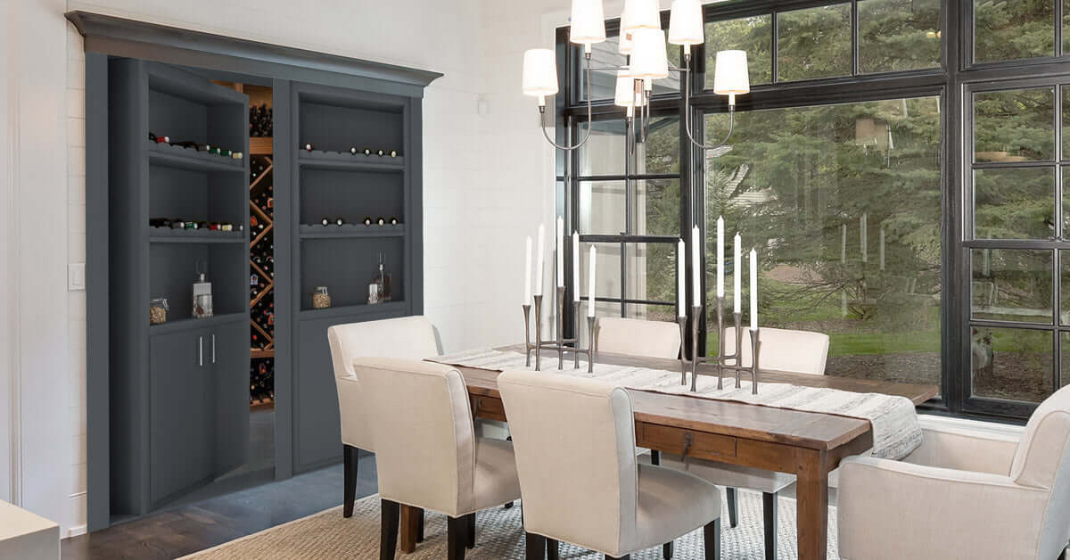 Dining room with large window and french murphy doors leading to wine cellar.