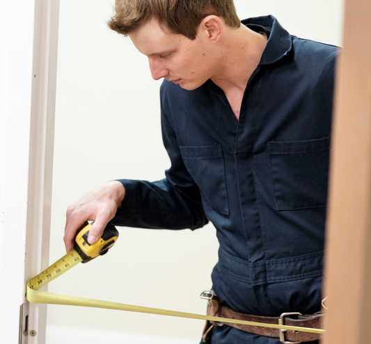 man following instructions about how to measure door size