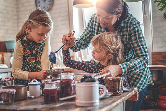 Family following summer canning tips to create preserves