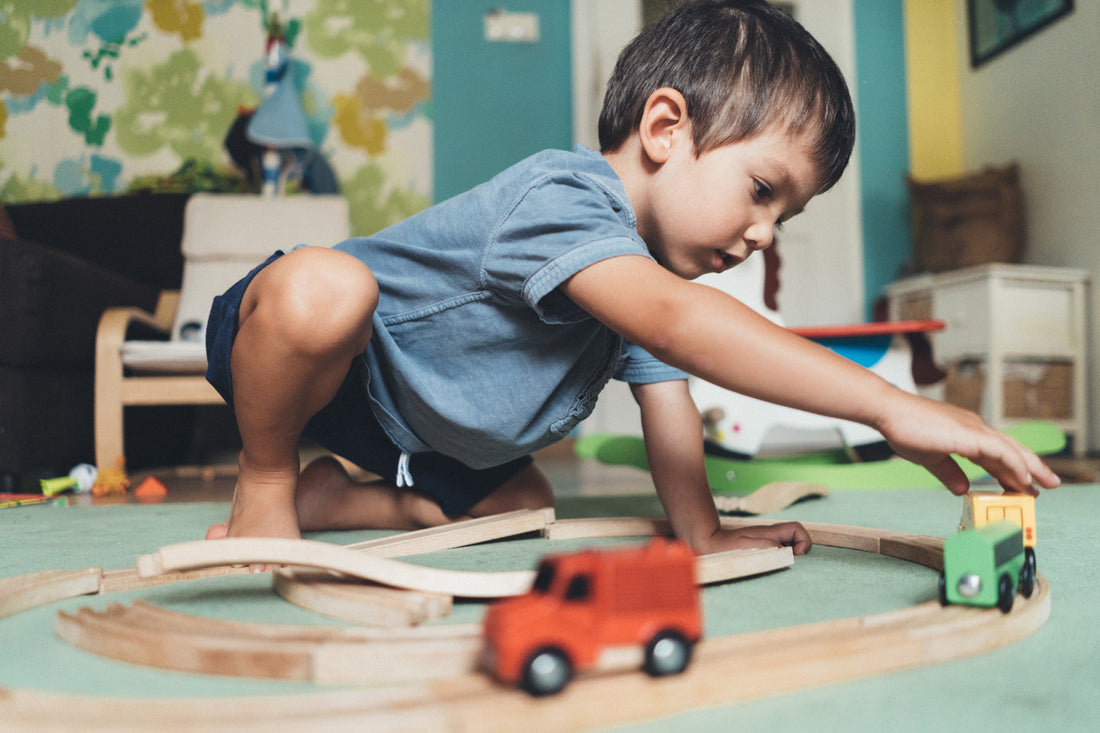 child playing in an organized playroom