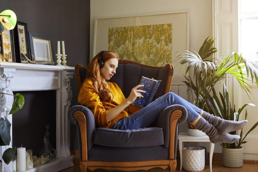 woman reading a book in her perfect reading room