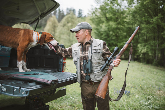 hunter and gun collector going on a hunting trip with a dog