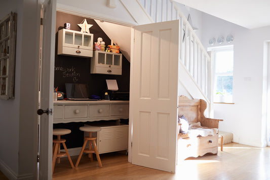 hidden storage space under your stairs in a well-lit home