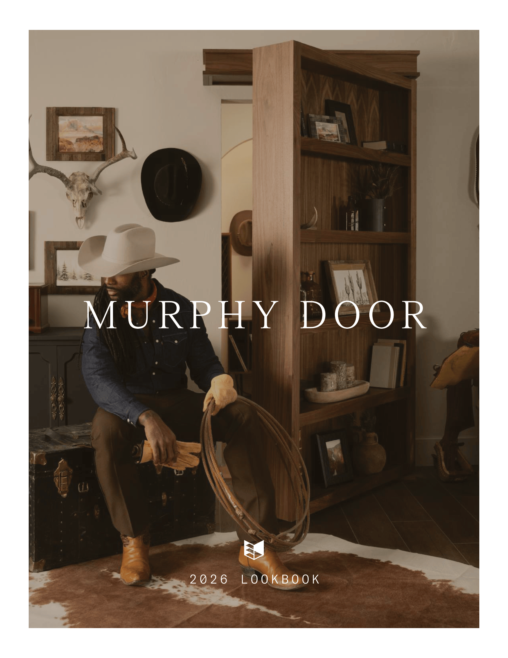 Dark wood Murphy Door® hidden bookshelf, slightly ajar, in a rustic room with a cowboy.