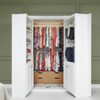 Murphy Door® Mirror Closet French Door, open to reveal a custom closet with white shelving, wooden drawers, and clothes racks.