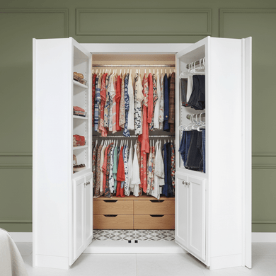 Murphy Door® Mirror Closet French Door, open to reveal a custom closet with white shelving, wooden drawers, and clothes racks.