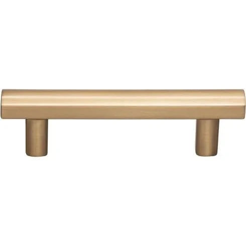Murphy Door® brushed gold hexagonal bar cabinet pull with cylindrical posts.