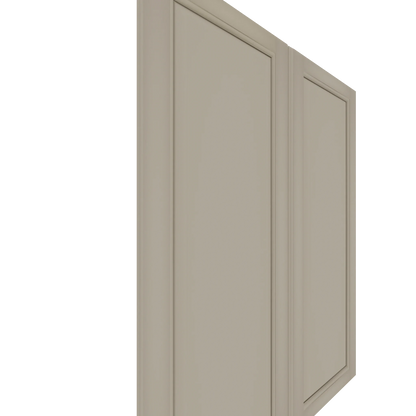 Two closed upper raised panel cabinet doors in a light greige paint finish