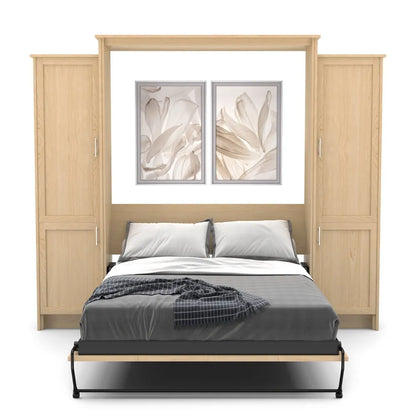 Murphy Door® light wood wall bed unit with dual storage cabinets, gray bedding, and floral artwork above the headboard.