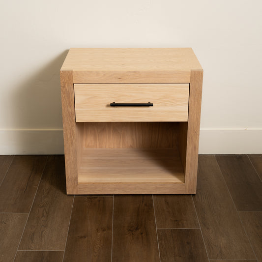 Murphy Door® Modern Murphy Concealment Nightstand: light oak, modern, with a black-handled drawer and open shelf.