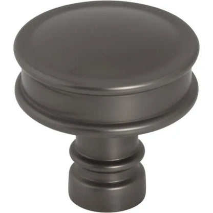 Murphy Door® round oil-rubbed bronze cabinet knob with a flat top and grooved stem.