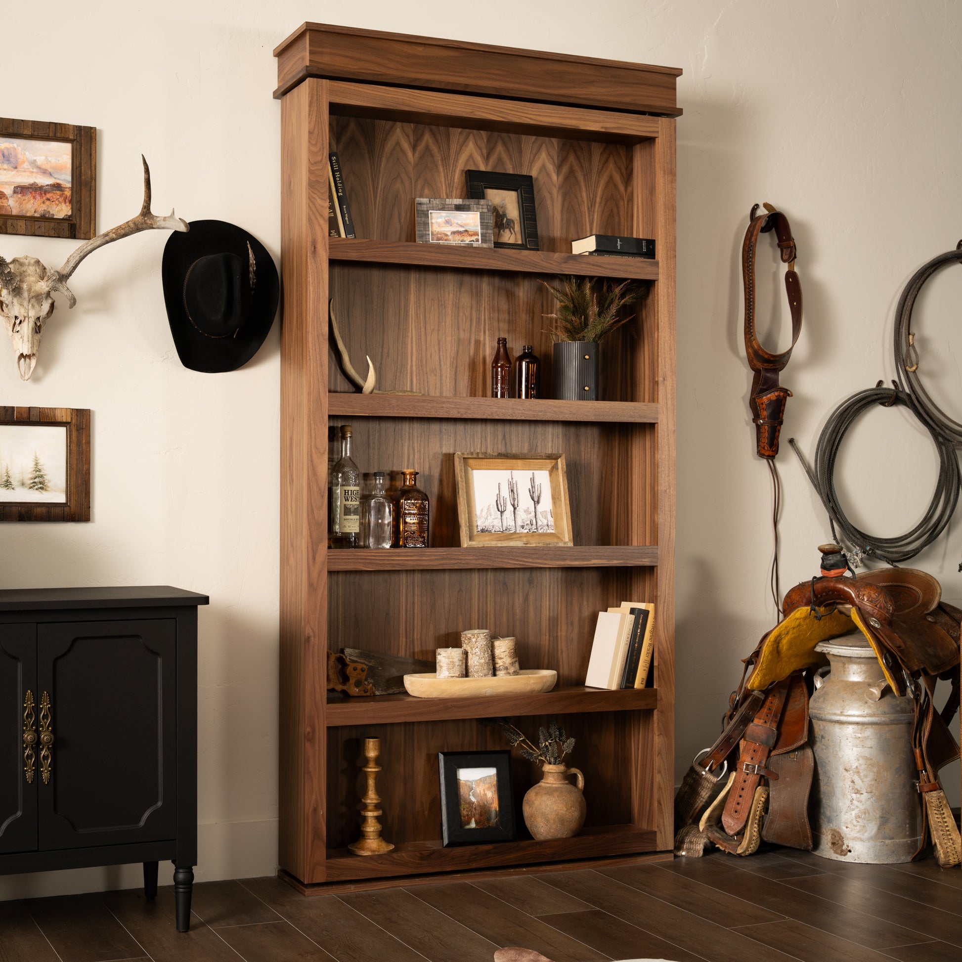 Murphy Door® Surface Mount Murphy Door: a dark wood hidden door bookcase with rustic Western decor.
