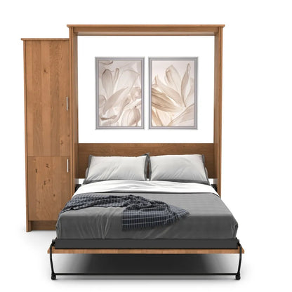 Murphy Door® wooden wall bed with built-in side cabinet, featuring oak frame, gray bedding, and floral artwork above the headboard.