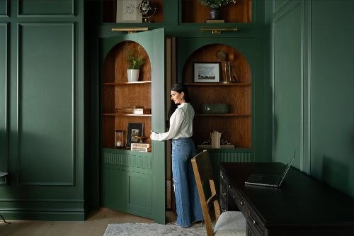 woman-opening-bookcase-french-door